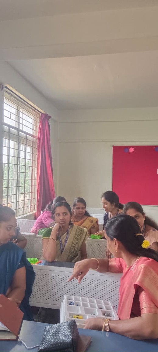 Teachers participating in an interactive group discussion